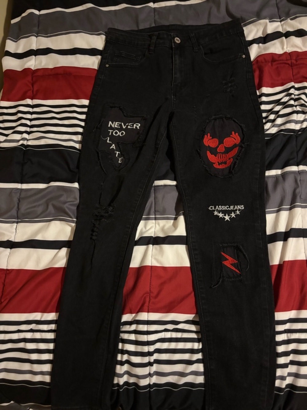 Shein  Black Distressed Patch Jeans with Red Skull and Slogan